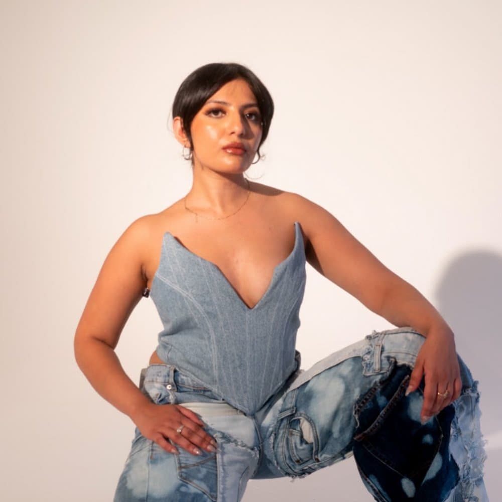 Gauri B